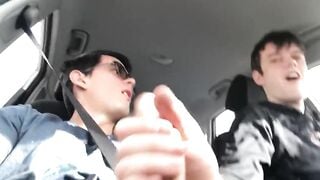 College gay friends enjoy handjob in car